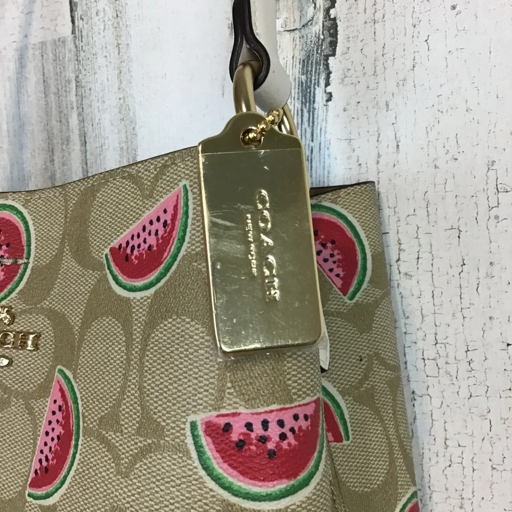 Coach Small Town Bucket Bag in Signature Canvas with a watermelon print. EUC - Picture 4 of 16